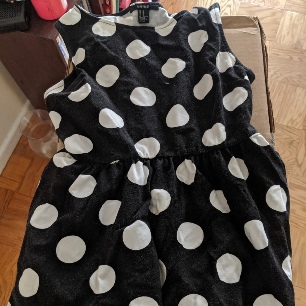 Black and white polka dot sleeveless dress